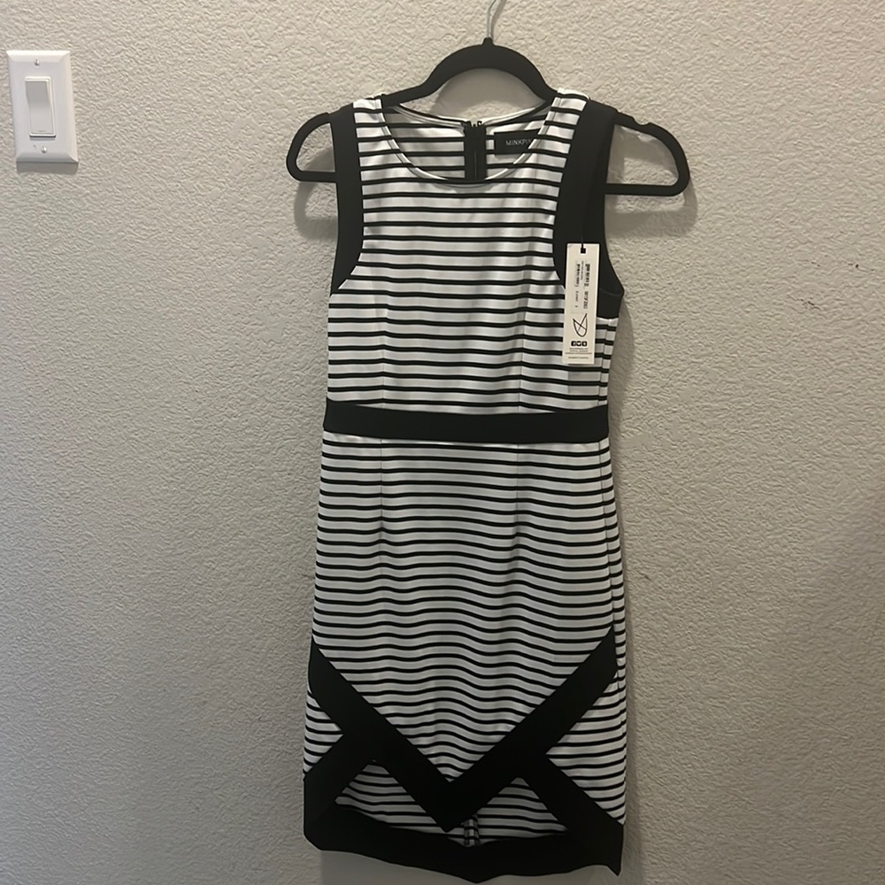 Business dress with fun hemline